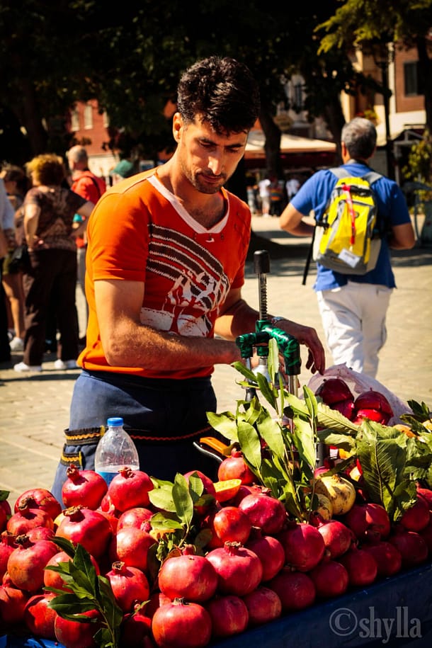 Turkish man selling Pomegranate fresh juice