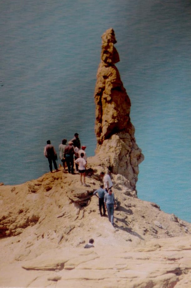 A statue of self-encrusted stone on a cliff above the Dead Sea dramatizes the Biblical story of Lot's wife who turned into a pillar of salt as she looked back toward Sodom and Gomorrah, Jordan.